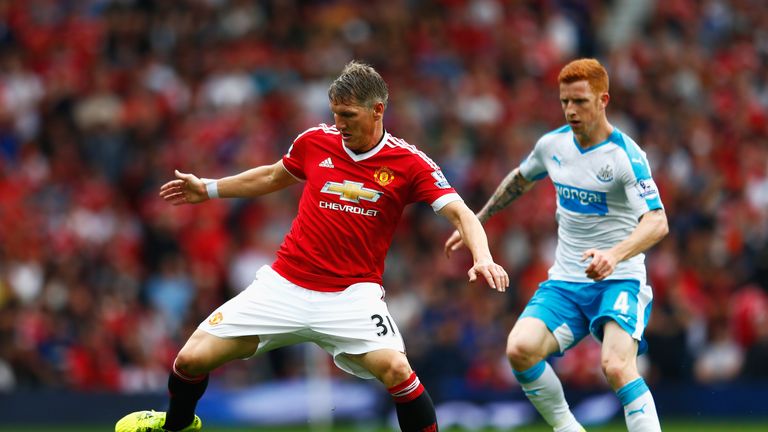 Bastian Schweinsteiger is closely marked by Jack Colback