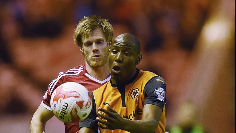 MIDDLESBROUGH, ENGLAND - APRIL 14:  Benik Afobe of Wolves shields the ball from Tomas Kalas of Middlesbrough during the Sky Bet Championship match between 