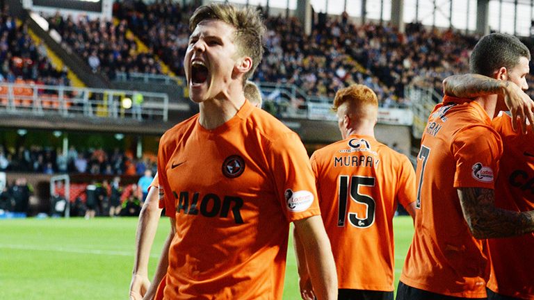 Dundee United's Blair Spittal celebrates after opening the scoring in the Dundee Derby.