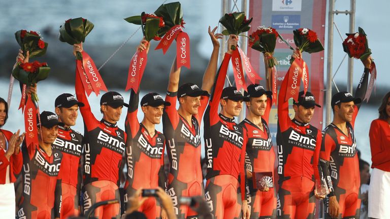 BMC's team celebrate on the podium after the first stage of the Vuelta a Espana cycling tour, a 7.4 kilometre race-against-the-clock between Puerto Banus 