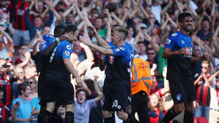Bournemouth players celebrate their third goal against West Ham