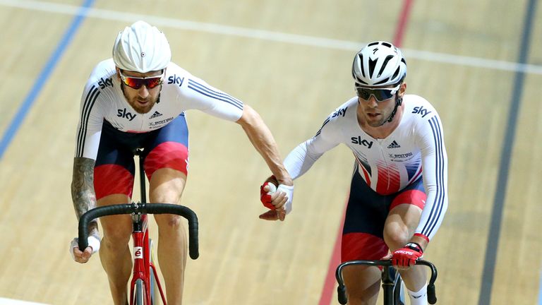 Sir Bradley Wiggins (left) and Mark Cavendish change over during the Madison during day three of the Revolution Series at Derby Arena.