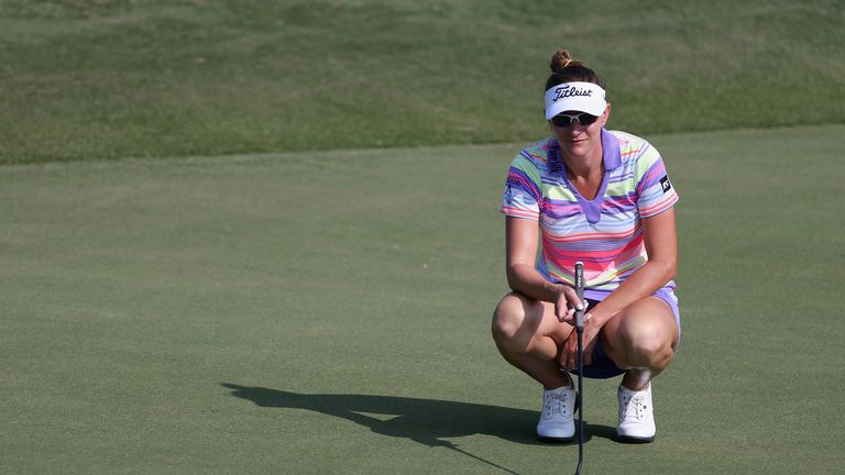 Brittany Lang lines up a shot on the 5th green during the first round of the Yokohama Tire LPGA Classic on August 27, 2015