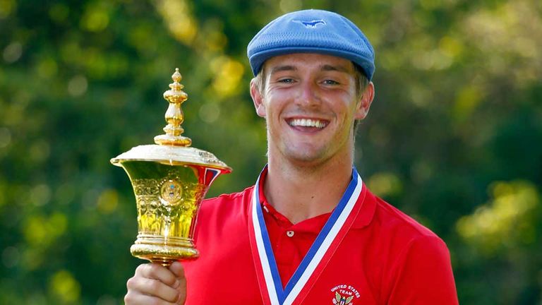 Bryson DeChambeau celebrates with the US Amateur Championship trophy