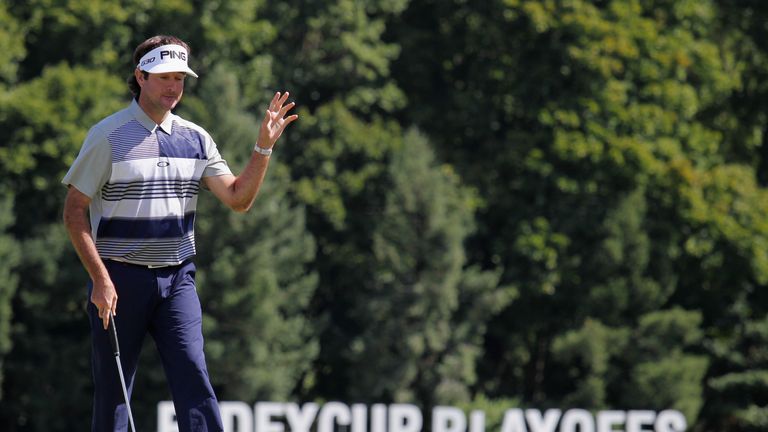 Bubba Watson of the United States waves after making birdie on the 18th hole during the first round of The Barclays at Plainfield 