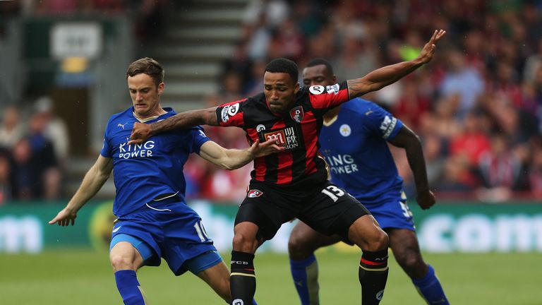 Callum Wilson of Bournemouth and Andy King of Leicester City compete for the ball 