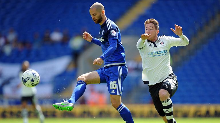 Cardiff City's Matthew Connolly (left) and Fulham's Ross McCormack battle for the ball on the opening day of the season