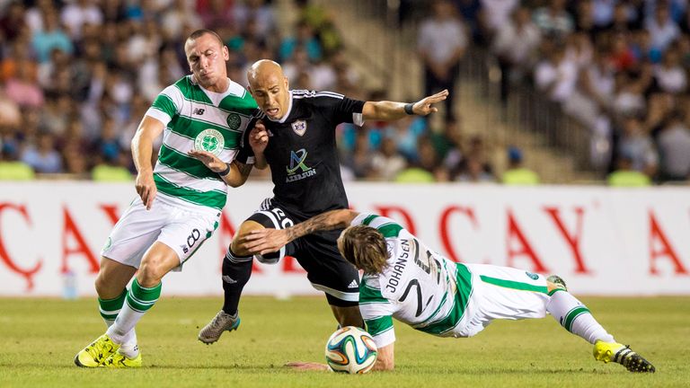 Celtic pair Scott Brown (left) and Stefan Johansen (right) sandwich Qarabag's Richard Almeida