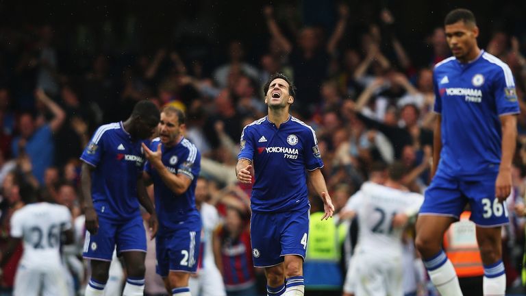 Cesc Fabregas of Chelsea looks dejected after Joel Ward scored Crystal Palace's 2nd goal during the Barclays Premier League clash at Stamford Bridge