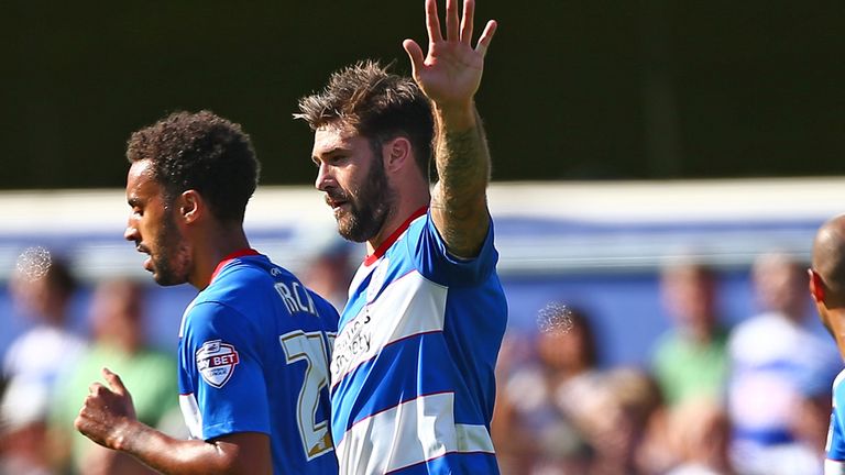 Charlie Austin celebrates after scoring for QPR