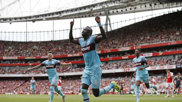 Cheikhou Kouyate celebrates after heading West Ham into the lead against Arsenal