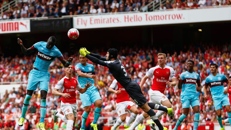 Petr Cech fails to punch the ball clear as Cheikhou Kouyate of heads in the opening goal at the Emirates