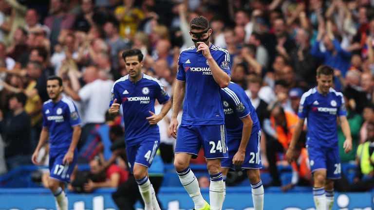 LONDON, ENGLAND - AUGUST 29:   Gary Cahill of Chelsea and Cesc Fabregas of Chelsea look dejected after Bakary Sako scores for Crystal Palace