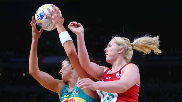 Sharni Layton of Australia and Chelsea Lewis of Wales compete for the ball 