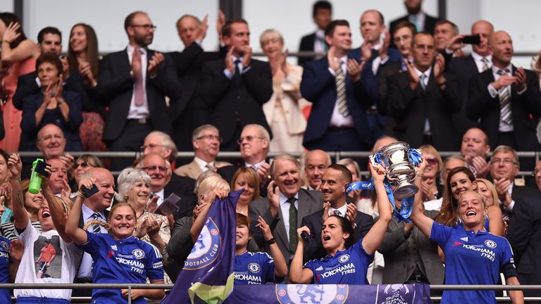 Chelsea players celebrate with the trophy at the end of the Women's FA Cup Final against Notts County at Wembley Stadium, London