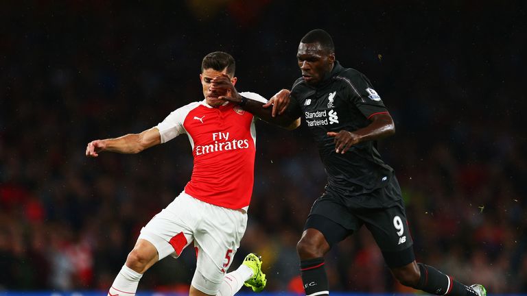 Liverpool's Christian Benteke holds off Gabriel Paulista