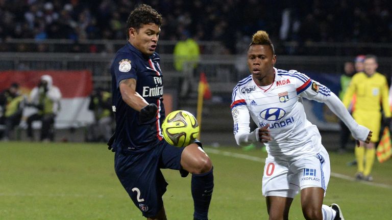 Lyon's Camerounese forward Clinton N'Jie (R) vies with Paris Saint-Germain's Brazilian defender Thiago Silva