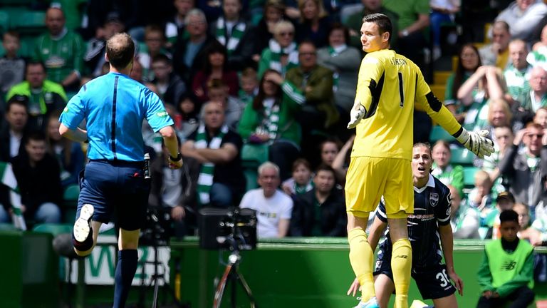 Celtic goalkeeper Craig Gordon could have been sent off for a foul on Ross County's Jackson Irvine.