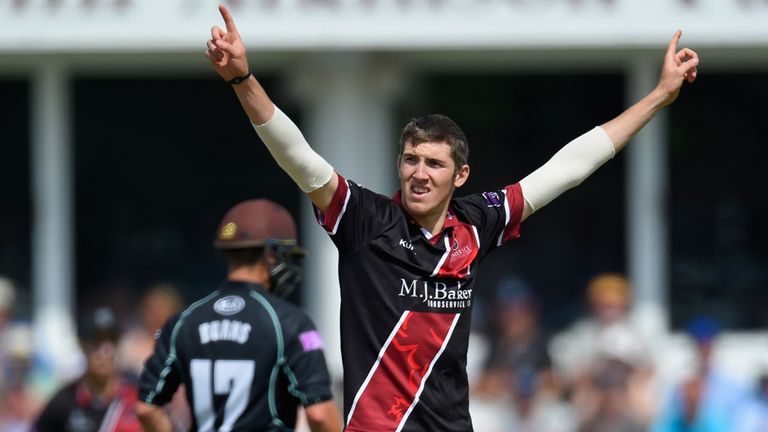 Somerset bowler Craig Overton celebrates after dismissing Surrey batsman Rory Burns 
