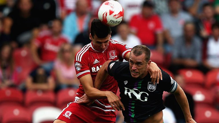 Daniel Ayala of Middlesbrough and Aaron Wilbraham of Bristol City challenge for the ball