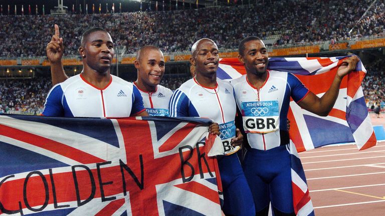 Campbell (far right) celebrates relay gold with Mark Lewis-Francis, Jason Gardener, and Marlon Devonish in 2004