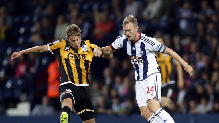 Darren Fletcher (R) of West Bromwich Albion and Sam Foley of Port Vale battle for the ball during the Capital One Cup  match