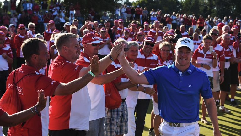 David Horsey of England greets the volunteers after winning the Made in Denmark at Himmerland Golf & Spa Resort