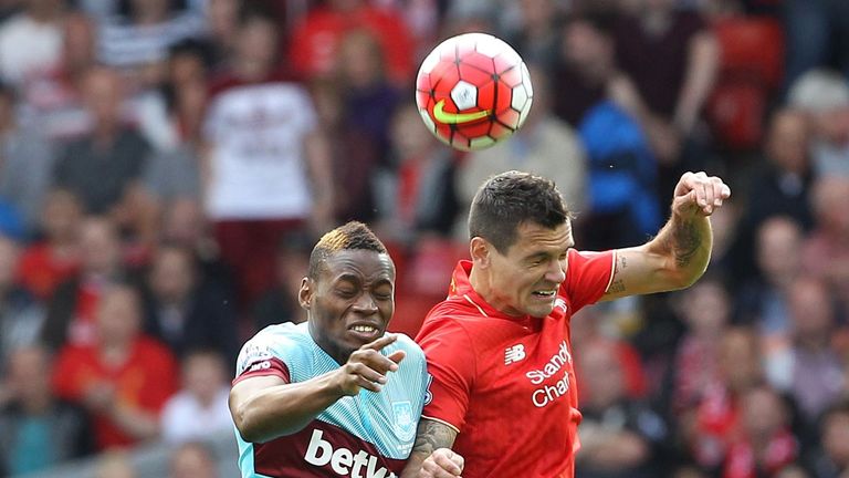 Dejan Lovren vies with Diafra Sakho during West Ham's 3-0 defeat at Anfield