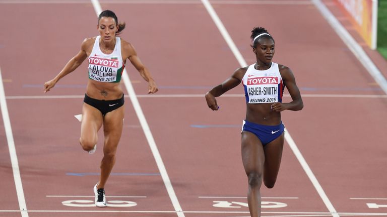 Britain's Dina Asher-Smith wins her World Championship heat in Beijing
