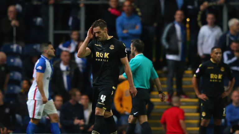 Dorian Dervite of Bolton Wanderers is sent off by referee Paul Tierney during the Sky Bet Championship match v Blackburn at Ewood Park