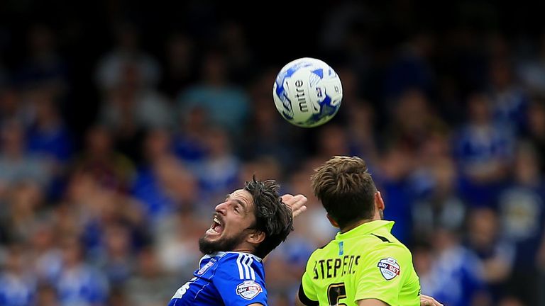 Ipwich's Jonathan Douglas battles with Dale Stephens in a five-goal thriller at Portman Road