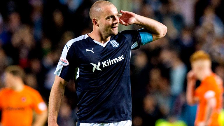 Dundee's James McPake celebrates after leveling the score.