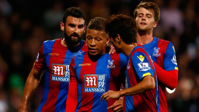 Dwight Gayle is congratulated after scoring for Palace