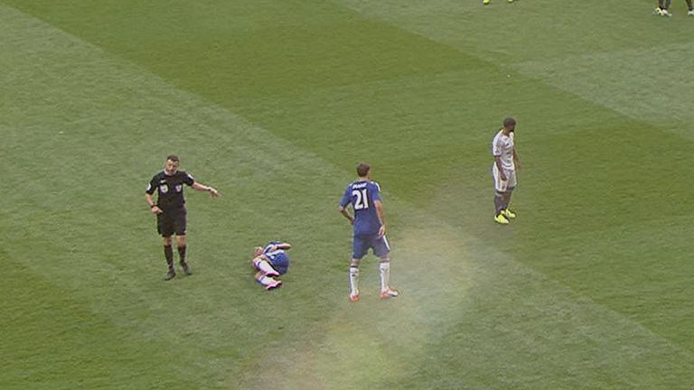 Referee Michael Oliver gives permission to the Chelsea medics to enter the field of play after Eden hazard told him he wanted treatment