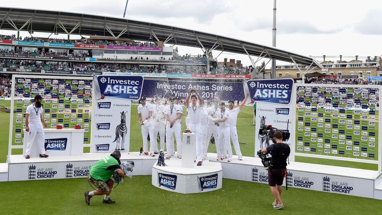 Alastair Cook and his England team celebrate winning the Ashes after day four of the 5th Investec Ashes Test match v Australia at The Kia Oval