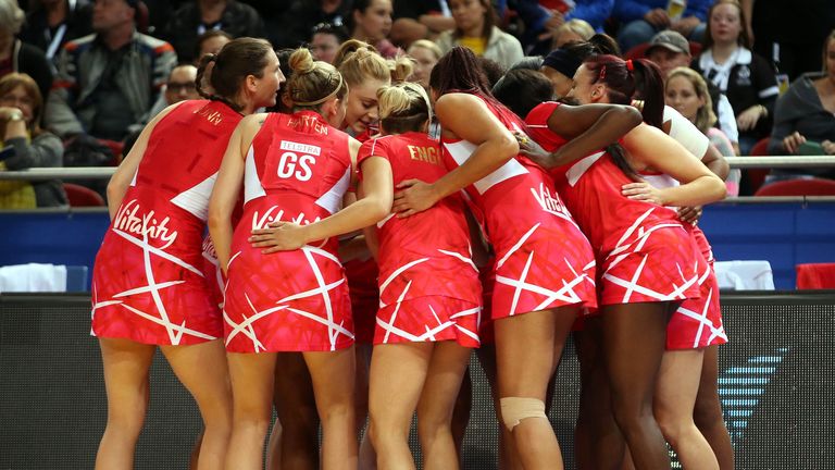 The England netball team huddle