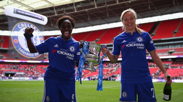 Eniola Aluko of Chelsea Ladies FC and Gemma Davison celebrates with the trophy after winning the Women's FA Cup on August 1, 2015