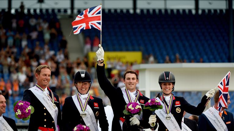 Carl Hester (L-R), Fiona Bigwood, Michael George Eilberg and Charlotte Dujardin after placing second at the Grand Prix Dressage Team Final