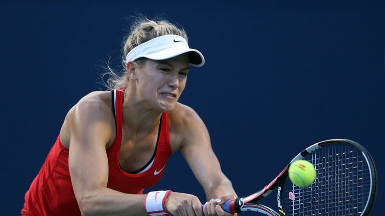 Eugenie Bouchard of Canada plays a shot against Belinda Bencic of Switzerland during Day 2 of the Rogers Cup at the Aviva Centre 