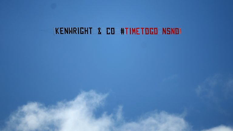 Everton fans flew a plane with a banner calling for chairman Bill Kenwright to leave