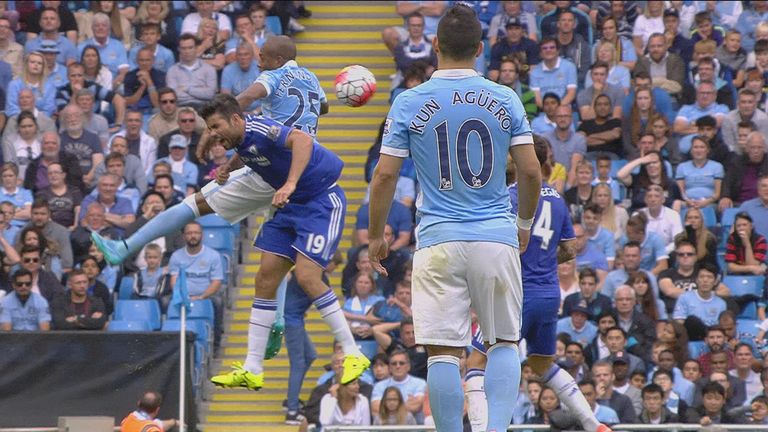 Manchester City's Fernandinho catches Diego Costa of Chelsea with his elbow.