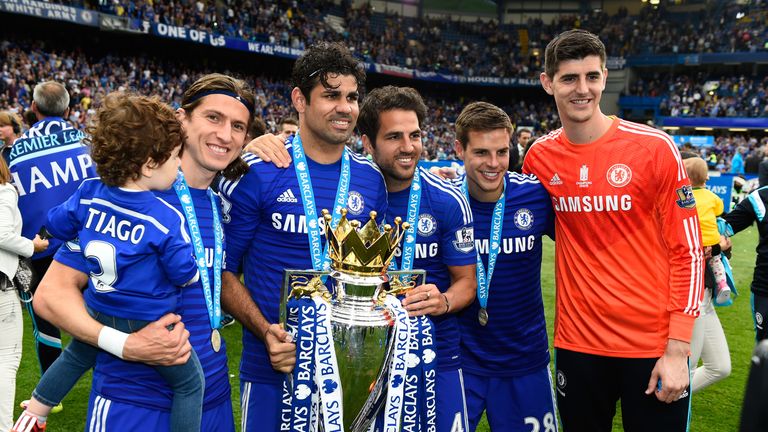  Filipe Luis, Diego Costa, Cesc Fabregas, Cesar Azpilicueta and Thibaut Courtois of Chelsea celebrate with the trophy after the Barclays Premier League