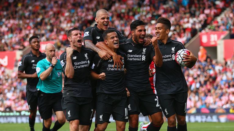 Philippe Coutinho of Liverpool (10) celebrates with team mates James Milner, Martin Skrtel, Emre Can and Roberto Firmino at Stoke