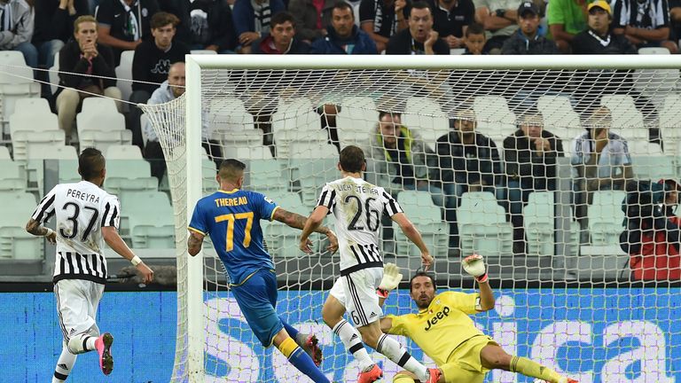 Cyril Thereau (C) of Udinese Calcio scores the opening goal during the Serie A match at Juventus