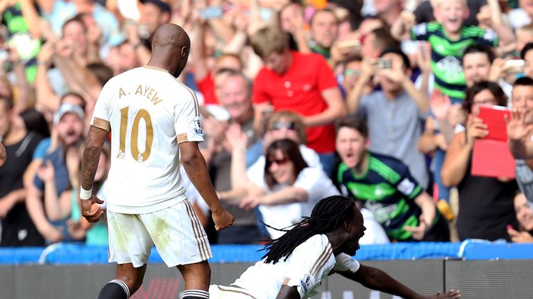 Swansea City's Bafetimbi Gomis celebrates scoring his side's second goal of the game during the Barclays Premier League match at Stamford Bridge, London.