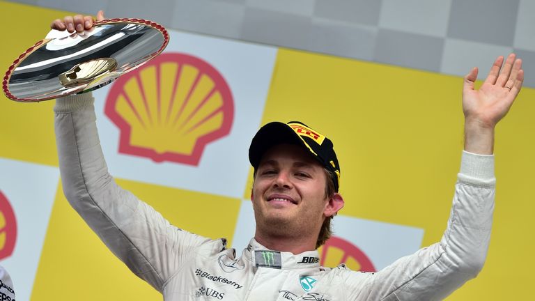 Second-placed Nico Rosberg celebrates  on the podium at Spa