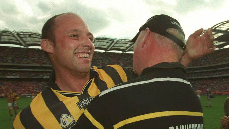 Kilkenny's Andy Comerford celebrates with manager Brian Cody after their All-Ireland final win over Cork in 2003