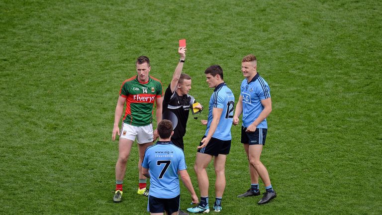 Diarmuid Connolly (second from right) is sent off by referee Joe McQuillan