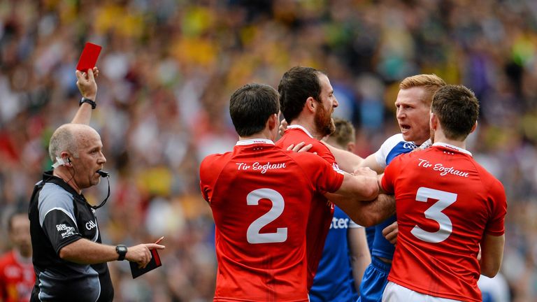 Referee Marty Duffy shows the red card to Monaghan's Owen Duffy