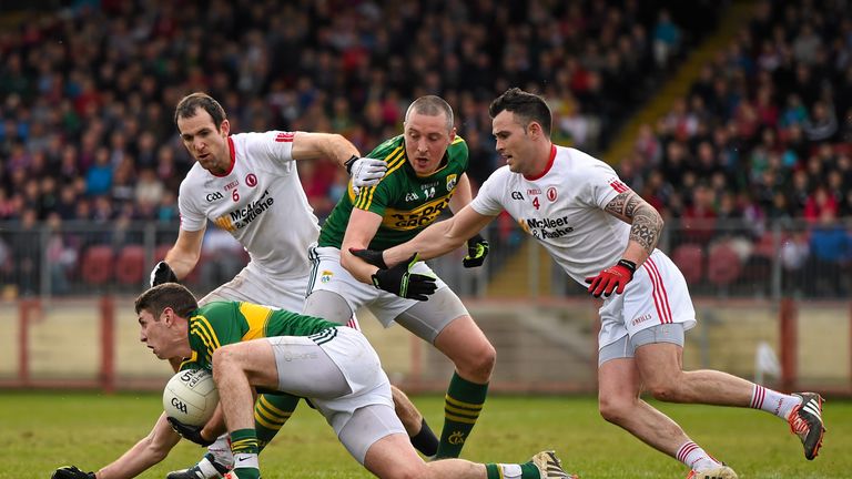 Paul Geaney, left, and Kieran Donaghy, Kerry, in action against Justin McMahon, left, and Cathal McCarron, Tyrone. National League 2015
